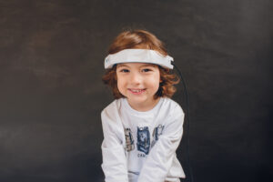 child with headset on